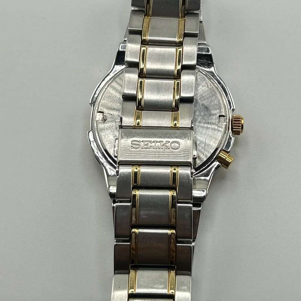 Seiko Men's SNQ076 Perpetual Calendar Two-Tone Watch #555